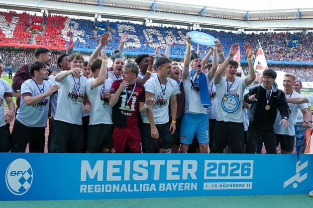 The U23 of 1 FC Nuernberg is honored for the championship in the Regionalliga Bayern, emotions, joy, 1 FC Nuernberg vs FC Schalke 04, football, men, 2 Bundesliga, DFL, season 2025 2026, 33 matchday, second round, 09 05 2026 DFB regulations prohibit any use of photographs as image sequences and or quasi video Nuernberg Bayern Germany Copyright: xkolbert-press MartinxAgüerax