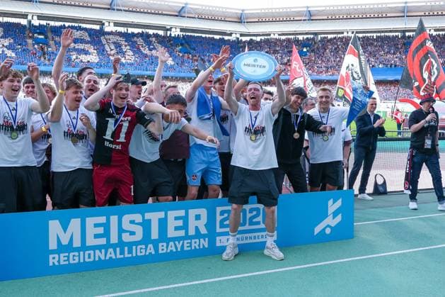 The U23 of 1 FC Nuernberg is honored for the championship in the Regionalliga Bayern, emotions, joy, 1 FC Nuernberg vs FC Schalke 04, football, men, 2 Bundesliga, DFL, season 2025 2026, 33 matchday, second round, 09 05 2026 DFB regulations prohibit any use of photographs as image sequences and or quasi video Nuernberg Bayern Germany Copyright: xkolbert-press MartinxAgüerax