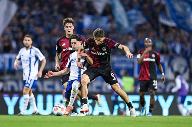 09 05 2026, Football, 2 Bundesliga, Season 2025 2026, Matchday 32, 1 FC Nürnberg FC Schalke 04, Soufiane El Faouzi FC Schalke 04 , Adam Markhiev 1 FC Nürnberg xRHR PHOTO YYx Copyright: KROEGER RHR-FOTOx RHR-FOTO YY