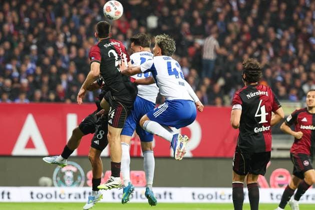 Action by Luca Lochosvili 24 1FC Nuernberg and Mertcan Ayhan 43 FC Schalke 04 , 1 FC Nuernberg vs FC Schalke 04, Football, Men, 2 Bundesliga, DFL, Saison 2025 2026, 33 Spieltag, Rueckrunde, 09 05 2026 DFB regulations prohibit any use of photographs as image sequences and or quasi video Nuernberg Bayern Germany Copyright: xkolbert-press MartinxAgüerax