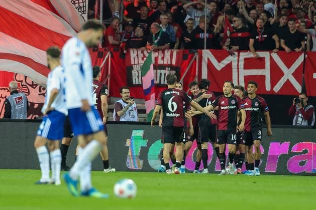 Mohamed Ali Zoma 23 1FC Nuernberg celebrates with teammates after the 3 0, 1 FC Nuernberg vs FC Schalke 04, Football, Men, 2 Bundesliga, DFL, Season 2025 2026, 33 Matchday, Second round, 09 05 2026 DFB regulations prohibit any use of photographs as image sequences and or quasi video Nuernberg Bayern Germany Copyright: xkolbert-press MartinxAgüerax