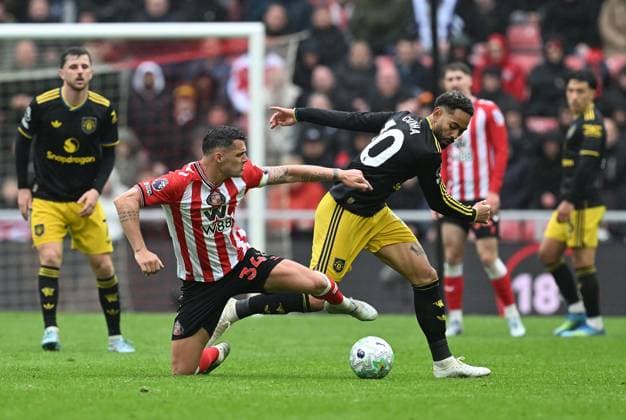 Granit Xhaka of Sunderland and Matheus Cunha of Manchester United, ManU Sunderland v Manchester United, Premier League, Football, Stadium of Light, Sunderland , UK - 09 May 2026Sunderland Stadium of Light United Kingdom EDITORIAL USE ONLY No use with unauthorised audio, video, data, fixture lists, club league logos or live services. Online in-match use limited to 120 images, no video emulation. No use in betting, games or single club league player publications.  Copyright: xAnnaxGowthorpe Shutterstockx 16861687bg