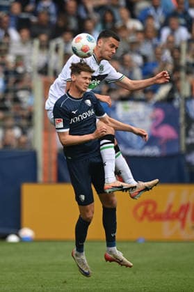 Oliver OLSEN BO vs Bastian ALLGEIER Hannover 96 header duel, action, duel, Football 2 Bundesliga, Matchday 33, VfL Bochum BO Hannover 96 1 1 on 09 05 2026 at Vonovia Ruhrstadion Bochum Germany DFL regulations prohibit any use of photographs as image sequences and or quasi video Â