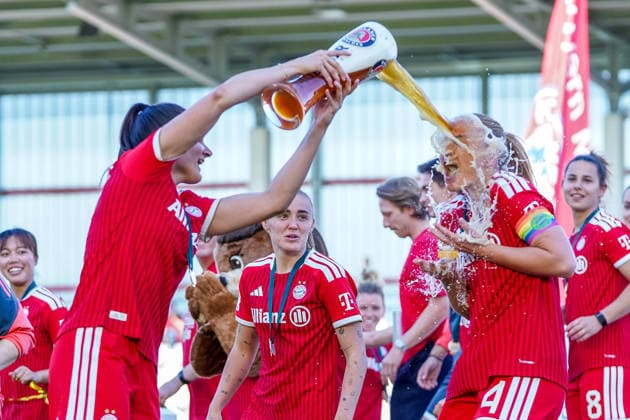Jovana Damnjanovic 9 Bayern gives Glodis Viggosdottir 4 FC Bayern a Paulaner wheat beer shower at the celebration of the German championship of the Google Pixel Womens Bundesliga 2025 2026 on 09 05 2026 Munich FC Bayern Campus Bayern Germany