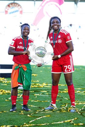 Bernadette Amani 15 Bayern and Edna Imade 29 Bayern celebrate winning the German championship of the Google Pixel Womens Bundesliga 2025 2026 with the championship trophy on 09 05 2026 Munich FC Bayern Campus Bayern Germany