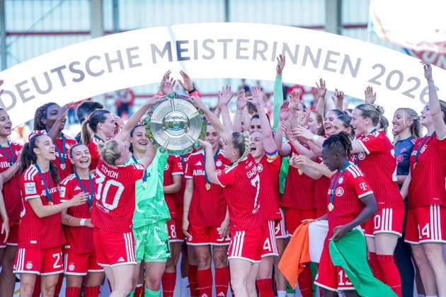 Carolin Simon 30 FC Bayern and Giulia Gwinn 7 FC Bayern hold the championship trophy in the air at the celebration of the German championship of the Google Pixel Womens Bundesliga 2025 2026 on 09 05 2026 Munich FC Bayern Campus Bayern Germany