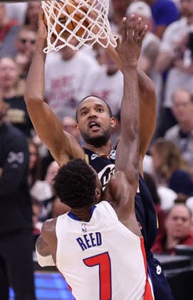 Cleveland Cavaliers Evan Mobley (4) shoots over Detroit Pistons Paul Reed (7) in the fourth quarter in Cleveland, Ohio Saturday May 9, 2026. The Cavaliers defeated the Pistons 116-109.  CLE20260509119 AARONxJOSEFCZYK