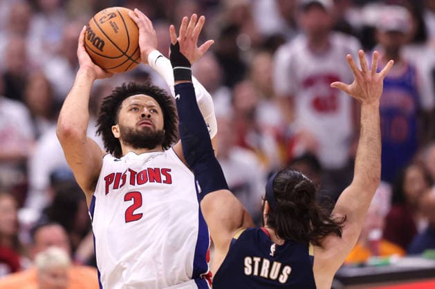 Detroit Pistons Cade Cunningham (2) shoots over Cleveland Cavaliers Max Strus (2) in the third quarter in Cleveland, Ohio Saturday May 9, 2026. The Cavaliers defeated the Pistons 116-109.  CLE20260509121 AARONxJOSEFCZYK