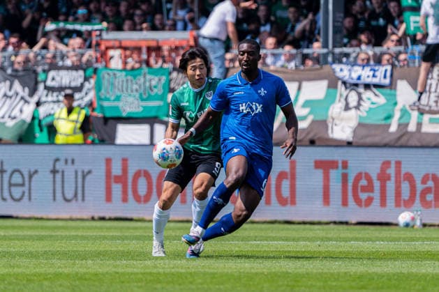 Münster, Germany 10 May 2026 2 BL 2025 2026 Sp 33 SC Preußen Münster vs SV Darmstadt 98 In the picture from left in duel Shin Yamada PRM and Patric Pfeiffer Darmstadt DFL DFB regulations prohibit any use of photographs as image sequences and or quasi video LVM Preussenstadion Nordrhein Westfalen Copyright: xFotostandx xKruczynskix