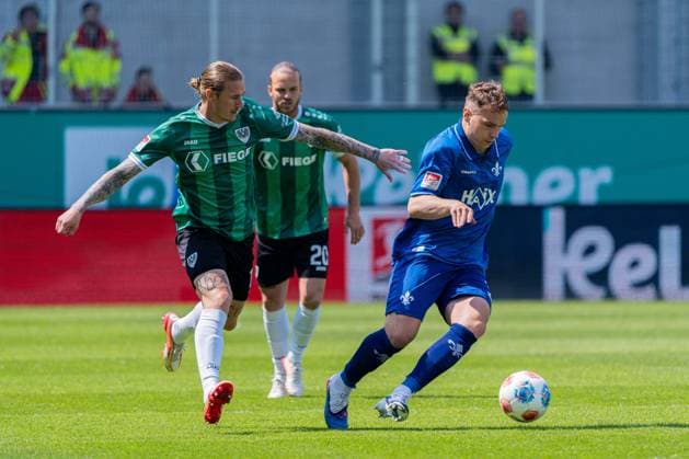 Münster, Germany 10 May 2026 2 BL 2025 2026 Sp 33 SC Preußen Münster vs SV Darmstadt 98 In the picture from left in a duel Marvin Schulz PRM and Niklas Schmidt Darmstadt DFL DFB regulations prohibit any use of photographs as image sequences and or quasi video LVM Preussenstadion Nordrhein Westfalen Copyright: xFotostandx xKruczynskix