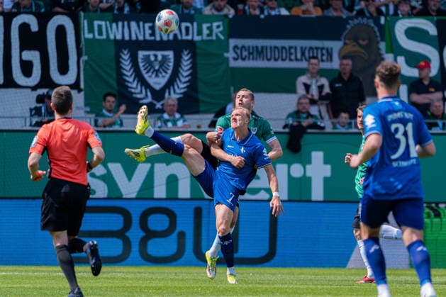 Münster, Germany 10 May 2026 2 BL 2025 2026 Sp 33 SC Preußen Münster vs SV Darmstadt 98 In the picture from left in duel Isac Lidberg Darmstadt and Torge Paetow PRM DFL DFB regulations prohibit any use of photographs as image sequences and or quasi video LVM Preussenstadion Nordrhein Westfalen Copyright: xFotostandx xKruczynskix