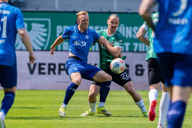 Münster, Germany 10 May 2026 2 BL 2025 2026 Sp 33 SC Preußen Münster vs SV Darmstadt 98 In the picture from left in duel Isac Lidberg Darmstadt and Jannis Heuer PRM DFL DFB regulations prohibit any use of photographs as image sequences and or quasi video LVM Preussenstadion Nordrhein Westfalen Copyright: xFotostandx xKruczynskix
