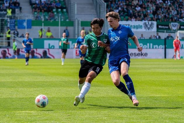 Münster, Germany 10 May 2026 2 BL 2025 2026 Sp 33 SC Preußen Münster v SV Darmstadt 98 Pictured from left in duel Shin Yamada PRM and Grayson Dettoni Darmstadt DFL DFB regulations prohibit any use of photographs as image sequences and or quasi video LVM Preussenstadion Nordrhein Westfalen Copyright: xFotostandx xKruczynskix
