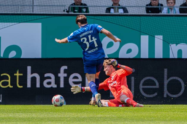 Münster, Germany 10 May 2026 2 BL 2025 2026 Sp 33 SC Preußen Münster vs SV Darmstadt 98 In the picture from left in duel Killian Corredor Darmstadt and goalkeeper Johannes Schenk PRM DFL DFB regulations prohibit any use of photographs as image sequences and or quasi video LVM Preussenstadion Nordrhein Westfalen Copyright: xFotostandx xKruczynskix