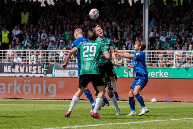 Münster, Germany 10 May 2026 2 BL 2025 2026 Sp 33 SC Preußen Münster v SV Darmstadt 98 Pictured from left in duel Kai Klefisch Darmstadt , Luca Bolay PRM and Yosuke Furukawa Darmstadt DFL DFB regulations prohibit any use of photographs as image sequences and or quasi video LVM Preussenstadion Nordrhein Westfalen Copyright: xFotostandx xKruczynskix