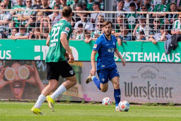 Münster, Germany 10 May 2026 2 BL 2025 2026 Sp 33 SC Preußen Münster vs SV Darmstadt 98 In the picture from left in duel Jannis Heuer PRM and Killian Corredor Darmstadt DFL DFB regulations prohibit any use of photographs as image sequences and or quasi video LVM Preussenstadion Nordrhein Westfalen Copyright: xFotostandx xKruczynskix