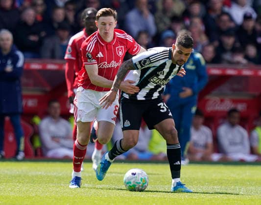 Nottingham, England, 10th May 2026. Elliot Anderson of Nottingham Forest (L) challenges Bruno Guimaraes of Newcastle United during the Nottingham Forest vs Newcastle United Premier League match at the City Ground, Nottingham. Picture credit should read: Andrew Yates Sportimage EDITORIAL USE ONLY. No use with unauthorised audio, video, data, fixture lists, club league logos or live services. Online in-match use limited to 120 images, no video emulation. No use in betting, games or single club league player publications. SPI_012_AY_NOTTS_FOREST_NEWC SPI-4792-0012