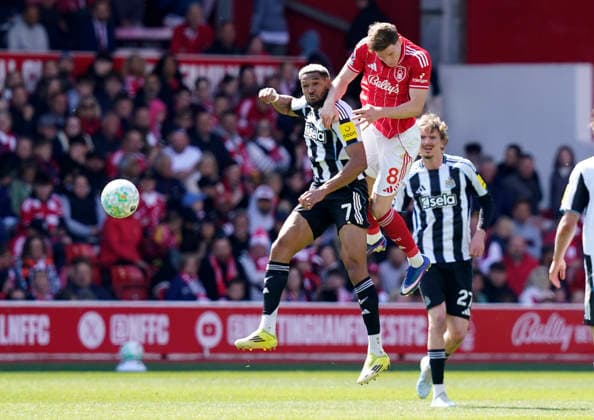 Nottingham, England, 10th May 2026. Joelinton of Newcastle United (L) is challenged by Elliot Anderson of Nottingham Forest during the Nottingham Forest vs Newcastle United Premier League match at the City Ground, Nottingham. Picture credit should read: Andrew Yates Sportimage EDITORIAL USE ONLY. No use with unauthorised audio, video, data, fixture lists, club league logos or live services. Online in-match use limited to 120 images, no video emulation. No use in betting, games or single club league player publications. SPI_016_AY_NOTTS_FOREST_NEWC SPI-4792-0016