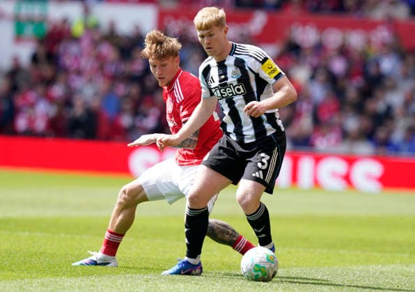 Nottingham, England, 10th May 2026. Lewis Hall of Newcastle United (R) is challenged by Luca Netz of Nottingham Forest during the Nottingham Forest vs Newcastle United Premier League match at the City Ground, Nottingham. Picture credit should read: Andrew Yates Sportimage EDITORIAL USE ONLY. No use with unauthorised audio, video, data, fixture lists, club league logos or live services. Online in-match use limited to 120 images, no video emulation. No use in betting, games or single club league player publications. SPI_017_AY_NOTTS_FOREST_NEWC SPI-4792-0017