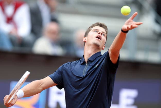 (260510) -- ROME, May 10, 2026 -- Alexander Blockx serves during the men s singles round of 32 match between Alexander Zverev of Germany and Alexander Blockx of Belgium at the ATP, Tennis Herren Italian Open tennis tournament in Rome, Italy, May 10, 2026. ) (SP)ITALY-ROME-TENNIS-ATP-ITALIAN OPEN-ROUND OF 32 LixJing 