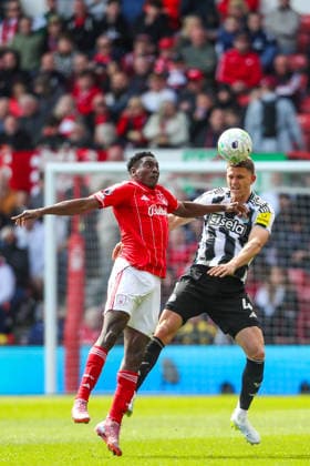 Nottingham Forest v Newcastle United, Premier League Sven Botman Of Newcastle United heads the ball ahead of Taiwo Awoniyi Of Nottingham Forest during the Nottingham Forest v Newcastle United Premier League match at the City Ground, West Bridgford, England on 10 May 2026 Credit: Lee Keuneke Every Second Media Editorial use only. All images are copyright Every Second Media Limited. No images may be reproduced without prior permission. All rights reserved. Premier League and Football League images are subject to licensing agreements with Football DataCo Limited. see https: www.football-dataco.com Copyright: xIMAGO EveryxSecondxMediax ESM-1980-0123 LeexKeunekex xEveryxSecondxMediax