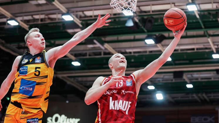 In the picture from left Toms Skuja MHP RIESEN Ludwigsburg, 5 against Marko Petric Wuerzburg Baskets, 13 on the ball 10 05 2026, Basketball, Fitness First Wuerzburg Baskets vs MHP Riesen Ludwigsburg, easyCredit BBL, 34 Matchday, Germany, 97072, tectake Arena Wuerzburg, Copyright: HMBxMedia xJulienxBecker