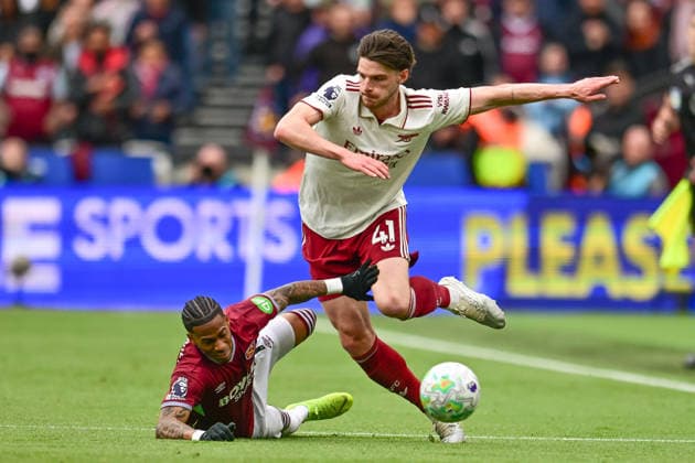 West Ham United v Arsenal, Premier League West Ham United forward Crysencio Summerville (7) tackles Arsenal midfielder Declan Rice (41) during the Premier League match between West Ham United and Arsenal at the London Stadium, London, UK on 10 May 2026. London London Stadium UK Editorial use only DataCo restrictions apply See www.football-dataco.com , Copyright: xDennisxGoodwinx PSI-24232-0033