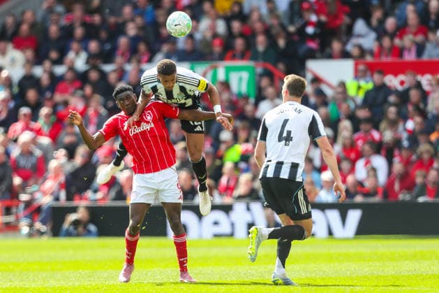 Nottingham Forest v Newcastle United, Premier League Malick Thiaw Of Newcastle United heads the ball ahead of Taiwo Awoniyi Of Nottingham Forest during the Nottingham Forest v Newcastle United Premier League match at the City Ground, West Bridgford, England on 10 May 2026 Credit: Lee Keuneke Every Second Media Editorial use only. All images are copyright Every Second Media Limited. No images may be reproduced without prior permission. All rights reserved. Premier League and Football League images are subject to licensing agreements with Football DataCo Limited. see https: www.football-dataco.com Copyright: xIMAGO EveryxSecondxMediax ESM-1980-0152 LeexKeunekex xEveryxSecondxMediax