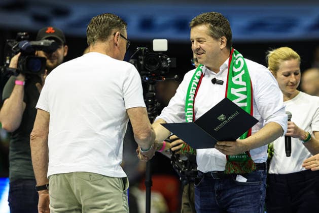 National coach Alfred Gislason receives the Order of Merit of Saxony-Anhalt from Minister President Sven Schulze CDU,Saxony-Anhalt Handball Bundesliga Season 2025 2026 SC Magdeburg vs HSV Hamburg at the GETEC Arena in Magdeburg Handball,Germany,10 05 2026