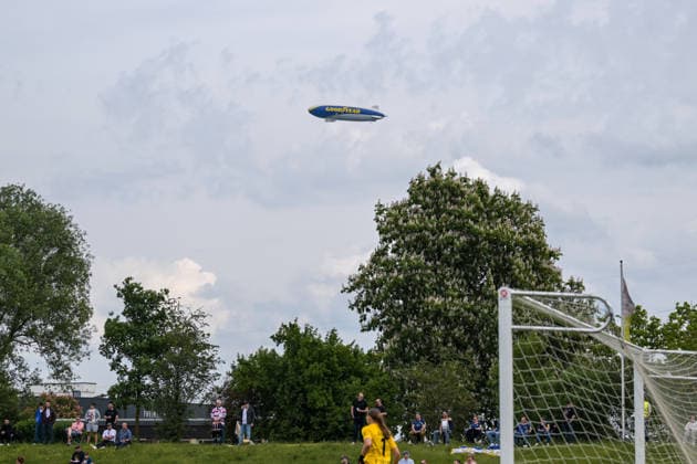 10 05 2026, Football, 2 Womens Bundesliga, 2025 2026, 25 Matchday, SG 99 Andernach SC Sand A zeppelin over the stadium There is a large lettering with Good Year to read Andernach Stadium Rhineland-Palatinate Germany