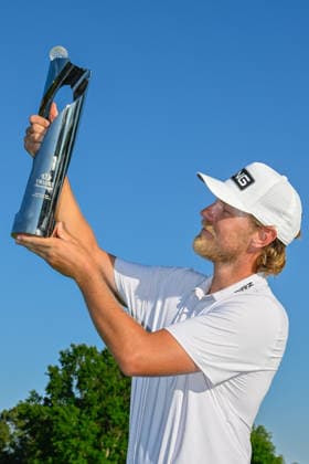 CHARLOTTE, NC - MAY 10: Kristoffer Reitan (NOR) holds the trophy for winning the Truist Championship on May 10, 2026, at the Quail Hollow Club in Charlotte, North Carolina. (Photo by Ken Murray Icon Sportswire) GOLF: MAY 10 PGA, Golf Herren Truist Championship EDITORIAL USE ONLY Icon2605100034