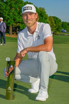 CHARLOTTE, NC - MAY 10: Kristoffer Reitan (NOR) with the trophy for winning the Truist Championship on May 10, 2026, at the Quail Hollow Club in Charlotte, North Carolina. (Photo by Ken Murray Icon Sportswire) GOLF: MAY 10 PGA, Golf Herren Truist Championship EDITORIAL USE ONLY Icon2605100064