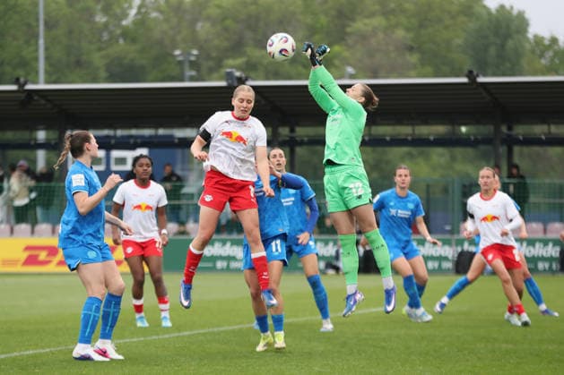Google Pixel Women Bundesliga, RB Leipzig Bayer Leverkusen 11 05 2026 Goalkeeper Rafaela Borggräfe 12, Bayer Leverkusen clears in the air in front of Emilia Kiaer Asgeirsdottir 8, RB Leipzig Football, Google Pixel Women Bundesliga, Season 2025 2026, 25 Matchday RB Leipzig vs Bayer 04 Leverkusen on 11 05 2026, Training Center Cottaweg, Leipzig DFB REGULATIONS PROHIBIT ANY USE OF PHOTOGRAPHS AS IMAGE SEQUENCES AND OR QUASI VIDEO Copyright: xBEAUTIFULxSPORTS JanxKaeferx