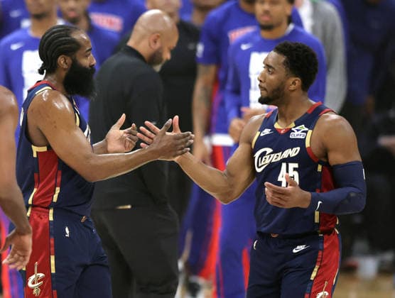 Cleveland Cavaliers James Harden (1) and Donovan Mitchell (45) shake hands during a time out against the Detroit Pistons in the first quarter in Cleveland, Ohio Monday May 11, 2026.  CLE20260511108 AARONxJOSEFCZYK