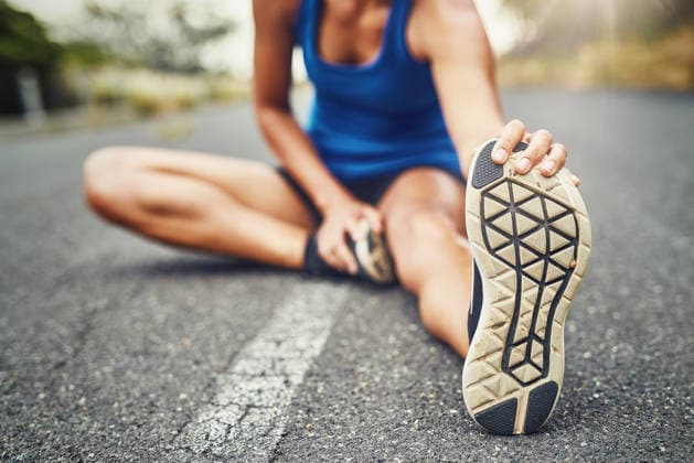Stretching leg, floor and woman in road with fitness for running challenge, marathon training or cardio in morning. Runner, warm up and athlete getting ready for workout, exercise or sports activity. (License=RF) 21871854 ,model released, Symbolfoto  Copyright: xZoonar.com YurixArcursx 21871854 ,model released, Symbolfoto ,property released