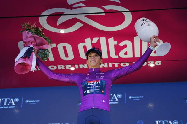 France™s Paul Magnier of Soudal Quick-Step cyclamin jersey on the podium during Stage 4 of the Giro d™Italia, from Catanzaro to Cosenza, Italy, Tuesday, May 12, 2026.  Copyright: xMassimoxPaolone LaPressex