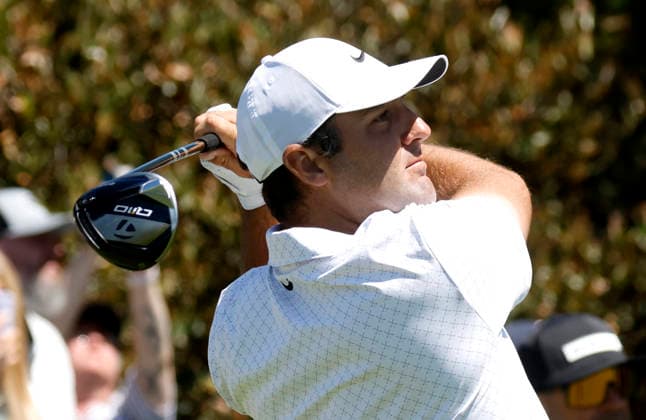 Scottie Scheffler hits a tee shot on the 1st hole during a practice round in the days leading up to the 108th PGA, Golf Herren Championship at Aronimink Golf Club on Tuesday, May 12, 2026 in Newtown, Pennsylvania.  PGA20260512121 JOHNxANGELILLO