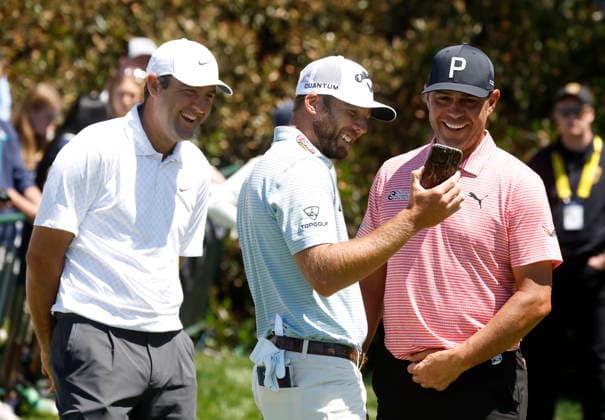 Scottie Scheffler, Sam Burns and Gary Woodland stand on the 1st hole tee box before a playing a practice round in the days before the 108th PGA, Golf Herren Championship at Aronimink Golf Club on Tuesday, May 12, 2026 in Newtown, Pennsylvania.  PGA20260512116 JOHNxANGELILLO