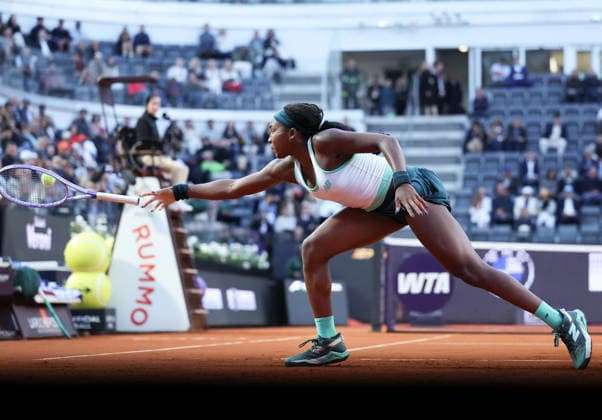 (260513) -- ROME, May 13, 2026 -- Coco Gauff of the United States tosses the racquet when hitting a return during the women s singles quarterfinal between Coco Gauff of the United States and Mirra Andreeva of Russia at the WTA, Tennis Damen Italian Open in Rome, Italy, May 12, 2026. ) (SP)ITALY-ROME-TENNIS-WTA-ITALIAN OPEN LixJing 