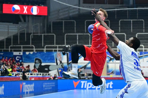 L-R Dusan Palat (CZE) and Karl Konan (FRA) in action during the World Handball Championship qualification playoff men s match: Czechia vs France in Brno, Czech Republic, May 13, 2026. (CTKxPhoto VaclavxSalek) CTKPhotoP2026051309090  CTKPhotoP2026051309090