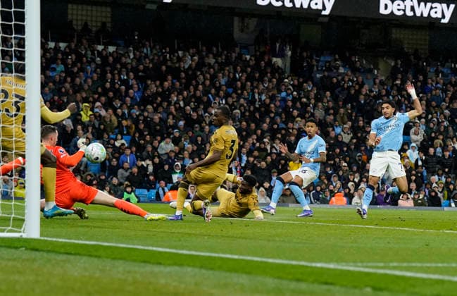 Manchester, England, 13th May 2026. Omar Marmoush of Manchester City scores their second goal during the Manchester City vs Crystal Palace Premier League match at the Etihad Stadium, Manchester. Picture credit should read: Andrew Yates Sportimage EDITORIAL USE ONLY. No use with unauthorised audio, video, data, fixture lists, club league logos or live services. Online in-match use limited to 120 images, no video emulation. No use in betting, games or single club league player publications. SPI_038_AY_Man_City_Palace SPI-4799-0037