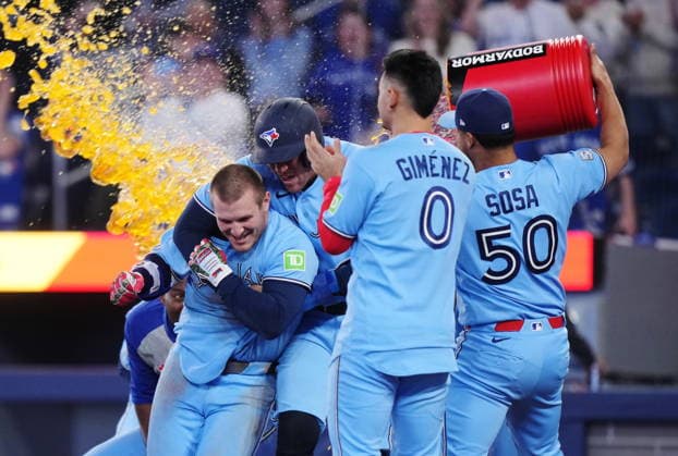 May 13, 2026, Toronto, On, CANADA: Toronto Blue Jays Daulton Varsho (left) celebrates his walk-off grand slam against the Tampa Bay Rays with teammates during 10th inning MLB, Baseball Herren, USA baseball action in Toronto on Wednesday, May 13, 2026. Canada News - May 13, 2026  - ZUMAc35_ 20260513_zaf_c35_195 Copyright: xNathanxDenettex