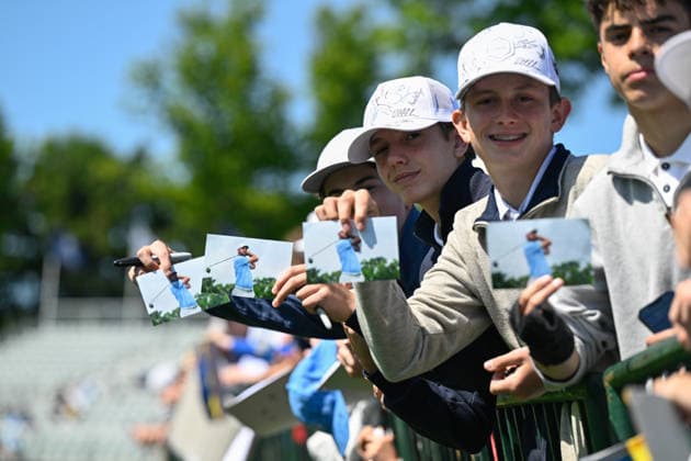 NEWTON SQUARE, PA - MAY 12: Young fans of Scottie Scheffler of United States of America are shown during the 2026 PGA, Golf Herren Championship on May 12th, 2026 at Aronimink Golf Club in Newtown Square, PA.(Photo by Terence Lewis Icon Sportswire) GOLF: MAY 12 PGA PGA Championship EDITORIAL USE ONLY Icon260512121