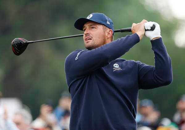 Bryson DeChambeau watches his tee shot on the 11th hole during the first round of the 2026 PGA, Golf Herren Championship at Aronimink Golf Club in Newtown Square, Pennsylvania, on Thursday, May 14, 2026.  PHI20260514817 LAURENCExKESTERSON