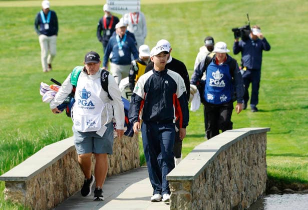 Min Woo Lee of Australia crosses a bridge to the 17th green during the first round of the 2026 PGA, Golf Herren Championship at Aronimink Golf Club in Newtown Square, Pennsylvania, on Thursday, May 14, 2026.  PHI20260514844 LAURENCExKESTERSON