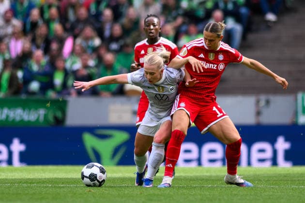 COLOGNE, GERMANY - 14 MAY, 2026: Thea Bjelde, Klara Buehl - The DFB-Pokal Frauen (Germany Women Cup) match Vfl Wolfsburg vs FC Bayern Munich at Rhein Energie Stadion  Copyright: xx
