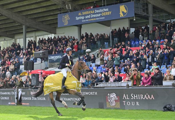 GER; Al Shira aa Deutsches Spring- & Dressur Derby Hamburg 14.05.2026, GER; Al Shira aa Deutsches Spring- & Dressur Derby Hamburg, Preis der Deutschen Vermögensberatung AG - Championat von Hamburg, Al Shira aa CSI5* Tour im Bild Sieger Cian OÂ Connor (IRL) auf Genghis Khan jubelt auf der Ehrenrunde *** GER Al Shira aa German Show Jumping Dressage Derby Hamburg 14 05 2026, GER Al Shira aa German Show Jumping Dressage Derby Hamburg, Prize of Deutsche Vermögensberatung AG Championat von Hamburg, Al Shira aa CSI5 Tour in the picture Winner Cian OÂ Connor IRL on Genghis Khan cheers on the lap of honor nordphotoxGmbH xWitke nph00002