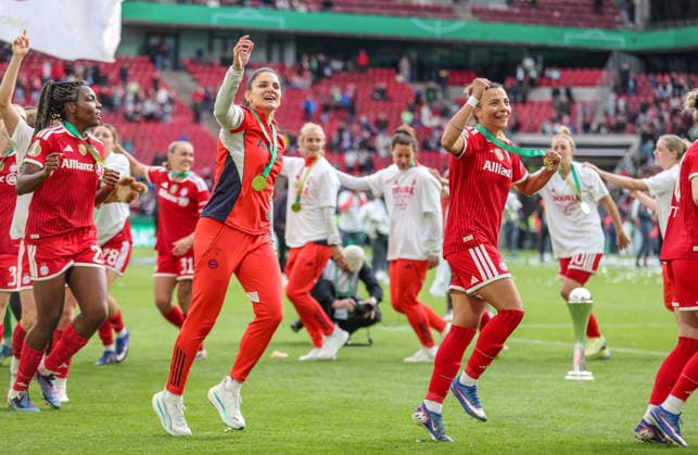 GER, Cologne, Vfl Wolfsburg vs FC Bayern Munich, DFB Cup Women, Football, DFB, Season 2025 2026, Rhein Energie Stadium, Final in picture Joy, Emotions after the victory in the DFB Cup Womens Final, Bayern Munich women win 4 0 by goals, cup, team, Jovana Damnjanović Bayern Munich 9 , Arianna Caruso Bayern Munich 27 DFB DFL REGULATIONS PROHIBIT ANY USE OF PHOTOGRAPHS AS IMAGE SEQUENCES AND OR QUASI VIDEO, 14 05 2026 Copyright: HMBxMedia HendrikxHamelau