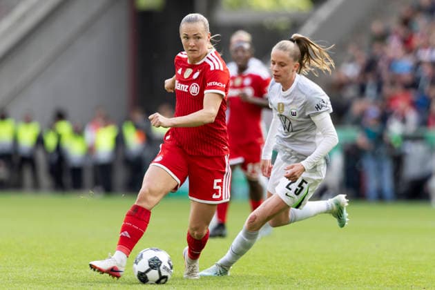 Magdalena ERIKSSON M 5, left on the ball in a duel against Vivien ENDEMANN WOB 25, right , action DFB Pokal der Frauen Finale 2026, VfL Wolfsburg WOB FC Bayern Muenchen M , final score 0 4, am 14 05 2026 in Koeln Germany DFB regulations prohibit any use of photographs as image sequences and or quasi video Â