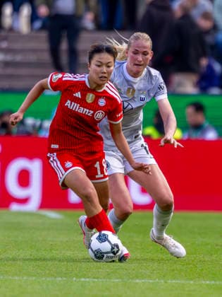 Cologne, Germany 14 May 2025 DFB Pokal Women 2025 2026 Final VfL Wolfsburg vs FC Bayern Munich Pictured from left in duel Momoko Tanikawa FCB and Camilla Küver Kuever VfL DFB regulations prohibit any use of photographs as image sequences and or quasi video RheinEnergieStadion Nordrhein Westfalen Copyright: xFotostandx xSchäferx